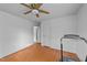 Bedroom with hardwood floors and ceiling fan at 702 Joyner St, Clayton, NC 27520
