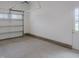 Two car garage with door opening and access to the backyard at 7723 Roberts Rd, Apex, NC 27523