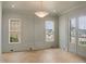 Bright, airy living room features hardwood floors, classic trim, and abundant natural light at 7723 Roberts Rd, Apex, NC 27523