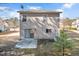 Backyard with a concrete patio and a sliding glass door at 912 Obsidian Way, Durham, NC 27703