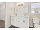 Bathroom with a double sink vanity and granite countertop at 912 Obsidian Way, Durham, NC 27703