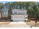 Charming two-story home featuring a spacious two-car garage and a well-maintained front yard at 912 Obsidian Way, Durham, NC 27703