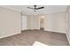 Spacious main bedroom with a ceiling fan and connected bathroom at 912 Obsidian Way, Durham, NC 27703