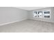 This bedroom features carpet flooring and a window with natural light at 913 Myers Point Dr, Morrisville, NC 27560