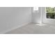 This bright bedroom features carpet flooring and natural light from two windows at 913 Myers Point Dr, Morrisville, NC 27560