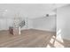 Bright, open-plan living space with modern finishes, hardwood floors, and integrated kitchen at 913 Myers Point Dr, Morrisville, NC 27560