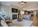 Spacious living room featuring a fireplace, hardwood floors, and an open concept design at 103 Bella Sq Sq, Smithfield, NC 27577