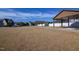 Neighborhood scene with a covered picnic area and a grassy field, inviting community gatherings and outdoor activities at 103 Bella Sq Sq, Smithfield, NC 27577