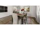 Spacious dining area featuring a wooden table with seating for four and modern decor at 124 Ethel Ln, Angier, NC 27501