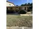 Charming single-story home with a well-maintained lawn, brick accents, and an inviting front door at 130 S Estes Dr # J1, Chapel Hill, NC 27514