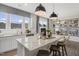 Kitchen island with granite countertops, stainless steel appliances, and pendant lighting, perfect for cooking and socializing at 136 Kobus Ct, Garner, NC 27529