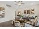 Open concept living room with modern decor flowing into kitchen and dining area at 136 Kobus Ct, Garner, NC 27529