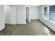 Bedroom with neutral carpet, double closets and abundant natural light at 1424 Elk Falls Dr, Wendell, NC 27591