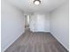 An inviting bedroom featuring neutral walls, plush carpeting, and a well-lit ceiling fixture at 1424 Elk Falls Dr, Wendell, NC 27591