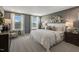 Comfortable main bedroom with stylish decor, lots of natural light, and neutral carpet at 152 Kobus Ct, Garner, NC 27529