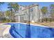 Backyard featuring a private pool, hot tub, and fenced-in yard at 198 Gentry Dr, Pittsboro, NC 27312