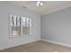 Bright bedroom with carpet, white walls, and natural light from a window at 198 Gentry Dr, Pittsboro, NC 27312