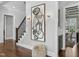 Foyer features dark hardwood floors, wainscotting and natural light at 198 Gentry Dr, Pittsboro, NC 27312
