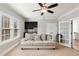 Inviting living room with a comfortable sofa, wet bar, and bright lighting, ideal for relaxation at 198 Gentry Dr, Pittsboro, NC 27312