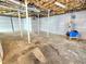 Unfinished basement with exposed ceiling and concrete flooring at 2024 Fox Den, Clayton, NC 27527