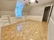 Cozy bedroom with built-in shelves, reading nook, and unique parquet floors at 2024 Fox Den, Clayton, NC 27527