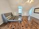 Bedroom with hardwood floors, ceiling fan, and natural light at 2024 Fox Den, Clayton, NC 27527
