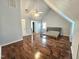 Bright bedroom with hardwood floors, ceiling fan, and natural light at 2024 Fox Den, Clayton, NC 27527