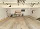 View of the garage with storage shelves and tools at 2024 Fox Den, Clayton, NC 27527