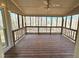 Enjoy nature in the large screened-in porch with wood flooring and views of the outdoors at 2024 Fox Den, Clayton, NC 27527