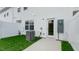Private fenced backyard with grass and a patio at 208 Starlight St, Sanford, NC 27330