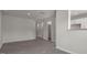 Spacious living room showcasing open floor plan with wood flooring and neutral paint at 216 Starlight St, Sanford, NC 27330