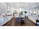 Bright kitchen with a large central island, quartz countertops, and modern appliances at 223 Harvester Rd, Angier, NC 27501