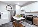 Modern laundry room featuring a sink, stainless steel appliances, and ample storage at 223 Harvester Rd, Angier, NC 27501