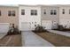Townhome exterior view with driveways and garages at 260 Chesapeake Commons St # 156, Garner, NC 27529