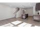 Spacious kitchen featuring stainless steel appliances, island and open floor plan at 260 Chesapeake Commons St # 156, Garner, NC 27529