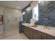 Contemporary bathroom with a glass shower, a double vanity, and stylish tile work for a luxurious feel at 306 Golden Leaf Farms Rd, Angier, NC 27501