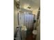 Functional bathroom with a shower-tub combo, vanity, and a well-lit mirror for daily routines at 3117 Cheek Rd, Durham, NC 27704