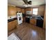 Practical kitchen with wood cabinets and essential appliances at 3117 Cheek Rd, Durham, NC 27704