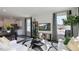 Bright living room with contemporary decor, stylish furniture, and large windows at 523 Old Battle Bridge Rd, Wendell, NC 27591