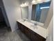 Bathroom featuring dual sinks, modern mirrors, and contemporary cabinets at 55 E Victory View. Ter, Smithfield, NC 27577