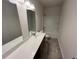 Modern bathroom featuring a spacious vanity with a wide mirror at 55 E Victory View. Ter, Smithfield, NC 27577