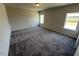 Spacious bedroom with large windows offering plenty of natural light at 55 E Victory View. Ter, Smithfield, NC 27577