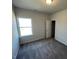 Cozy bedroom bathed in natural light with neutral walls and soft carpeting at 55 E Victory View. Ter, Smithfield, NC 27577
