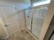 Bathroom featuring modern stand up shower with glass doors at 55 E Victory View. Ter, Smithfield, NC 27577
