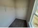 Walk-in closet providing ample storage space, enhanced by natural light at 55 E Victory View. Ter, Smithfield, NC 27577