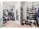 Large walk-in closet features custom shelving and ample space for storage and organization at 7212 Summer Tanager Trl, Raleigh, NC 27614