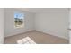 Bright bedroom with a large window for natural light at 832 Canis Minor Rd, Wendell, NC 27591