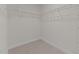 Walk-in closet with ample wire shelving for optimal storage at 832 Canis Minor Rd, Wendell, NC 27591