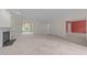 Spacious living room with a fireplace and large windows at 100 Edenburgh Rd # 202, Raleigh, NC 27608