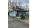 Exterior shot shows home with vinyl siding and small porch at 105 Hunt St # A-B, Oxford, NC 27565